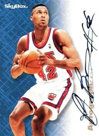1996-97 SkyBox Premium #NNO Autographics Blue Ink P.J. Brown