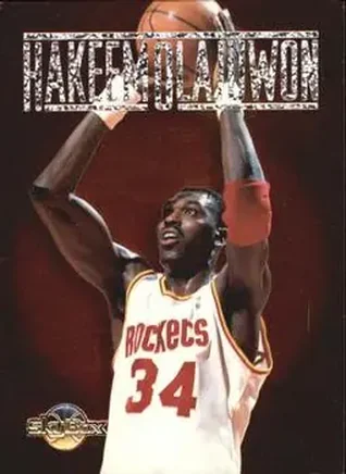 1994-95 SkyBox Premium - Center Stage #CS1 - Hakeem Olajuwon - Houston Rockets