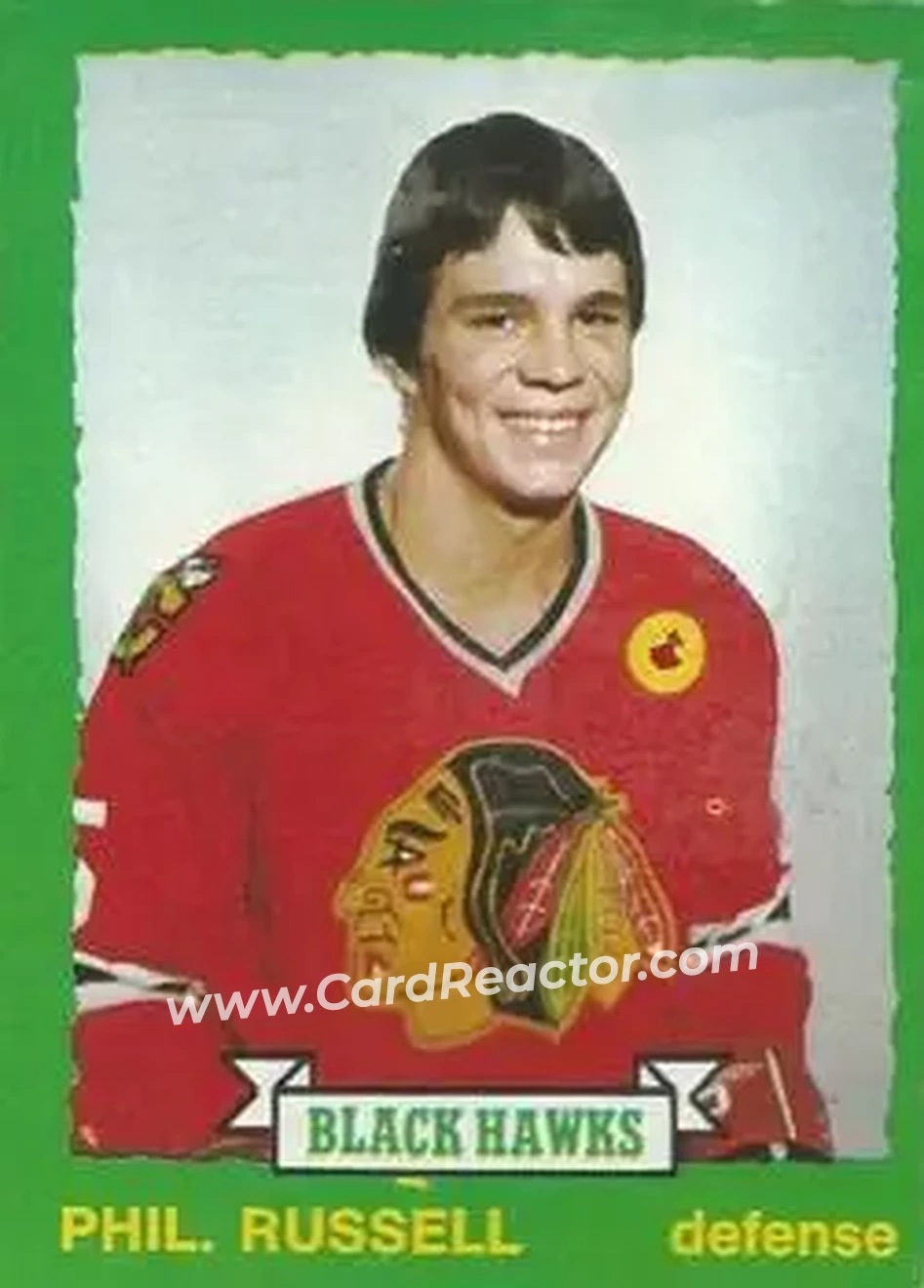 1973-74 O-Pee-Chee #243 - Phil Russell - Chicago Blackhawks - Front