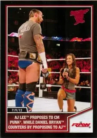 2013 Topps Best of WWE #23 AJ Lee Proposes to CM Punk, While Daniel Bryan Counters by Proposing to AJ