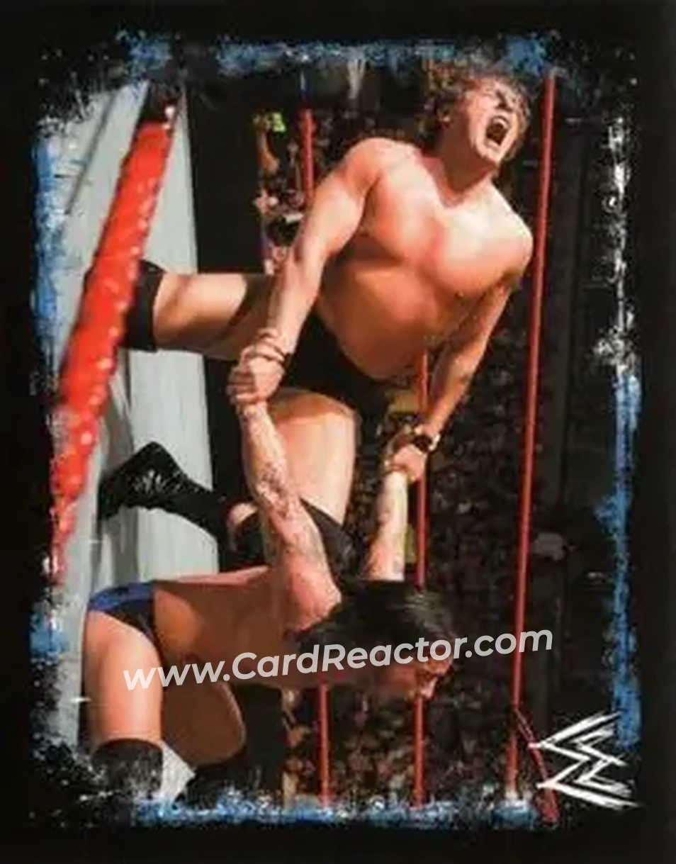2009 Topps WWE Rivals Spanish #42 - The Real Man's Man - Front 2009 Topps WWE Rivals Spanish #42 - The Real Man's Man - Front